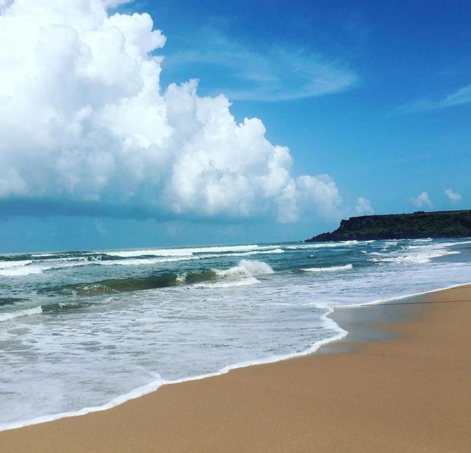 Dlite Beach Grove Cottages Alībāg Esterno foto